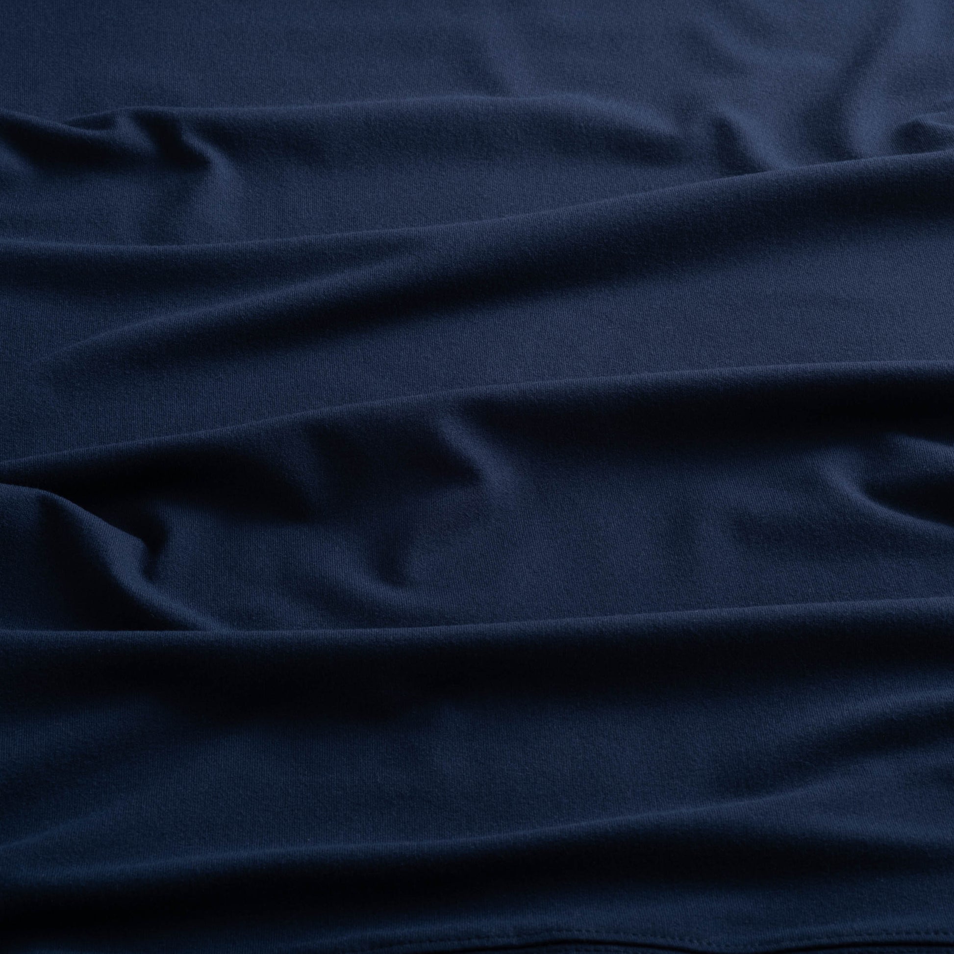 Close-up of the fabric of The Surfside Longsleeve Tee in beaufain blue color.