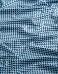 Close-up of the fabric of The Folly Checkered in Checker Tide.