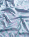 Close-up of the fabric of The Folly Checkered in Checker Chambray.