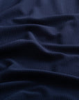 Close-up of the jacquard knit fabric of the Horizon Hoodie in Beaufain Blue.