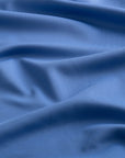 Close-up of the fabric of The Seabrook Performance 1/4 Zip in Marine Blue.