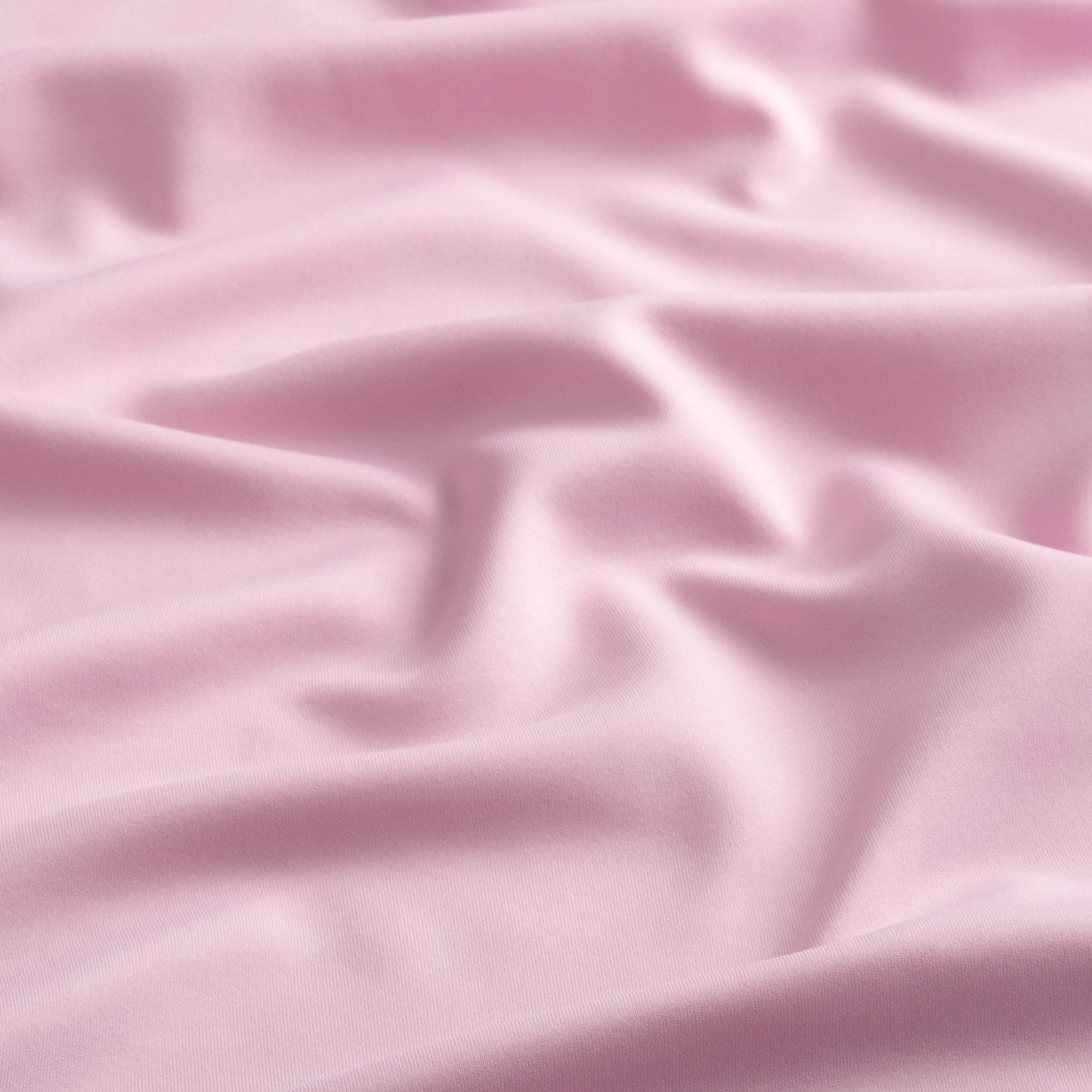 Close-up of the fabric of The Seabrook Performance 1/4 Zip in Mills Pink.