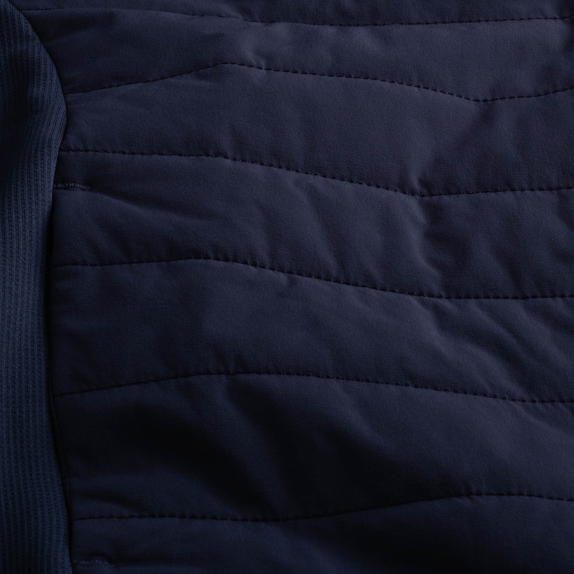 Close-up of the fabric of The Traveler Jacket in Beaufain Blue.