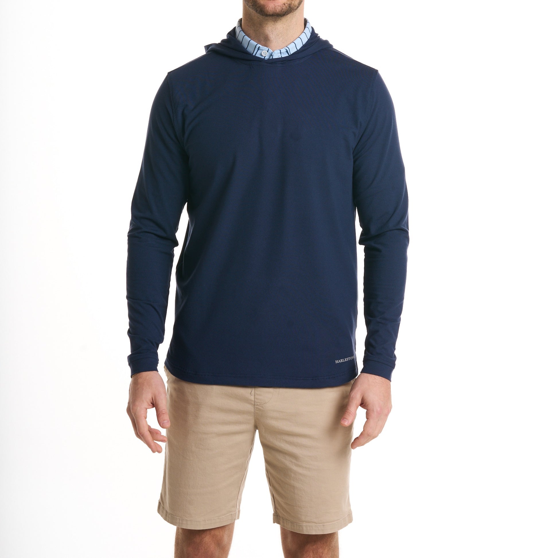 Close-up of a man wearing the Sport Hoodie in Beaufain Blue with khaki shorts, cropped from chin to knees, seen from front against a solid white background.