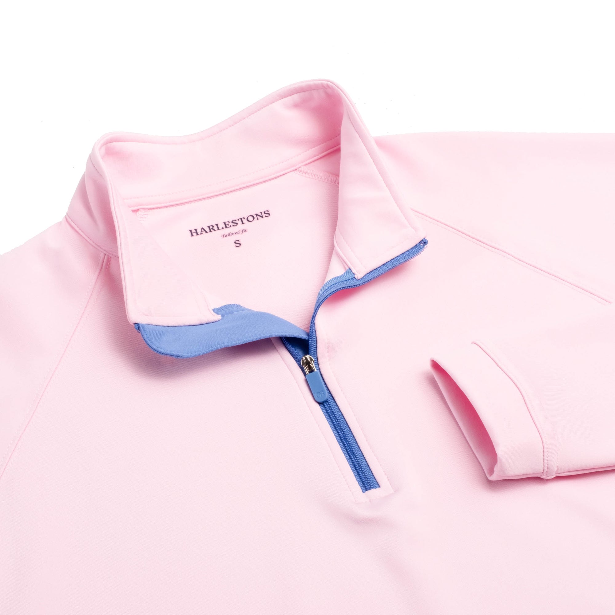 Close up of The Seabrook Performance 1/4 Zip&#39;s neck area in Mills Pink.