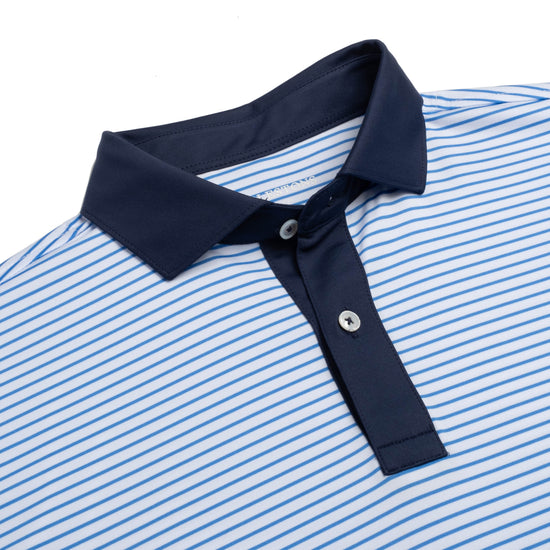 Close-up of the neck of the Preston performance polo in sonic color, featuring a three-button structured collar and mother of pearl buttons.