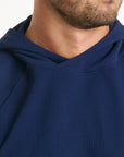 Male neck wearing the horizon hoodie in Beaufain Blue 